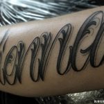 Script Letter Tattoo