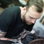 Sebastiaan Hess tattooing
