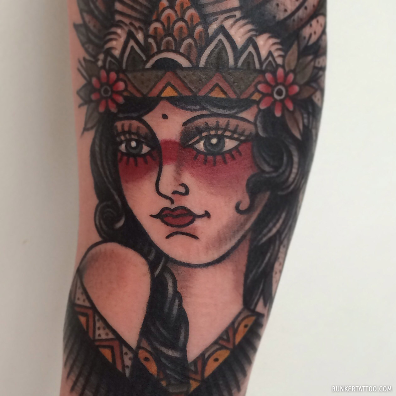 Traditional girl face tattoo – Bunker Tattoo – Quality tattoos
