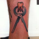 Traditional Tooth tattoo