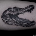 geometrical crocodile tattoo