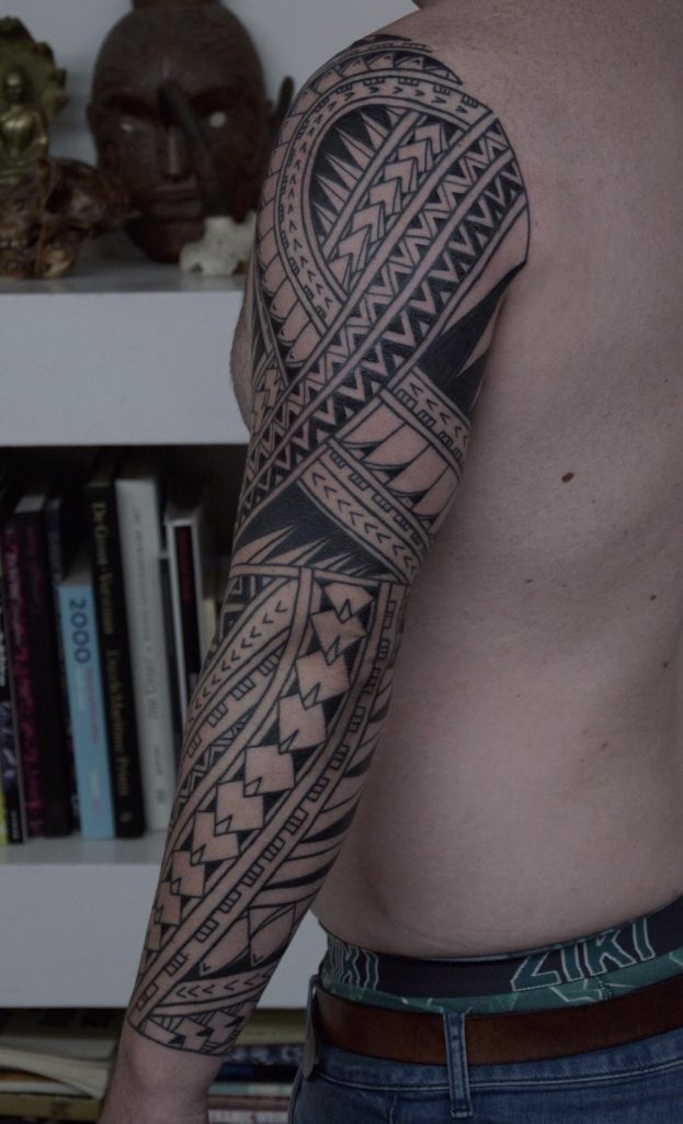 Polynesian sleeve tattoo