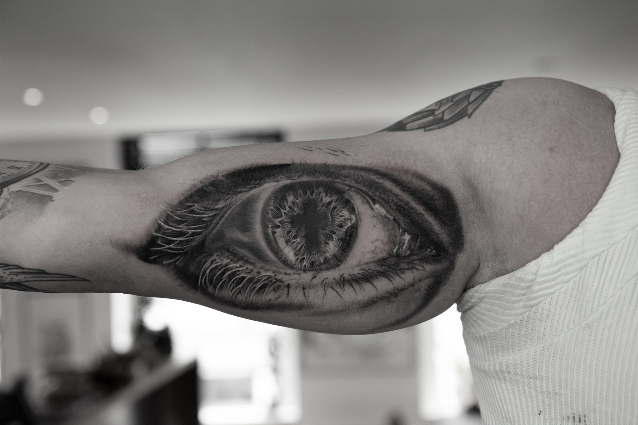 Black And Grey Realistic Eye Tattoo On Man Chest