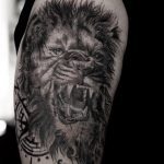 Realistic lion tattoo