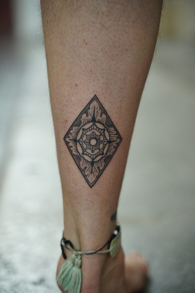 Ornamental tattoo from Manon and Vincent’s story, tattooed by Roger