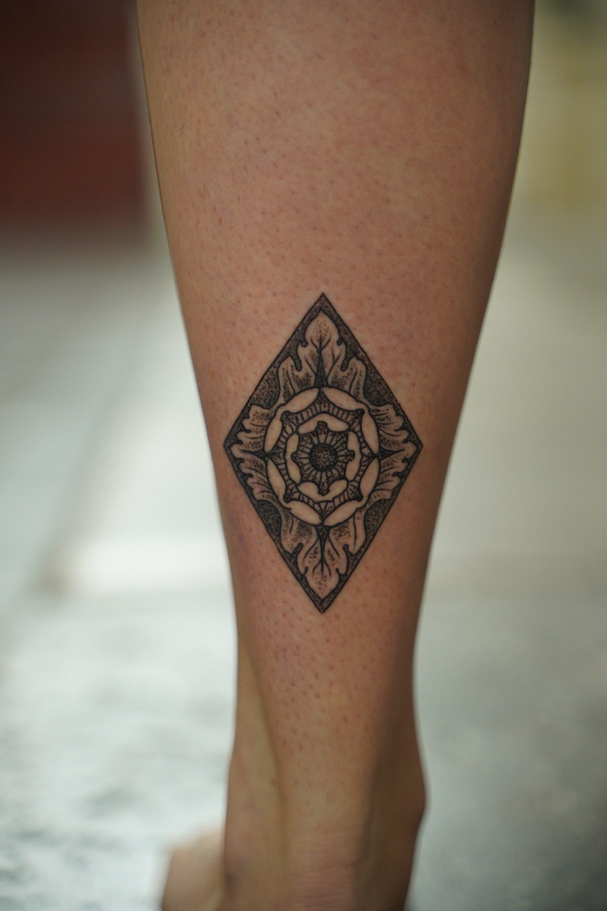 Ornamental tattoo on Vincent’s lower leg, tattooed by Roger